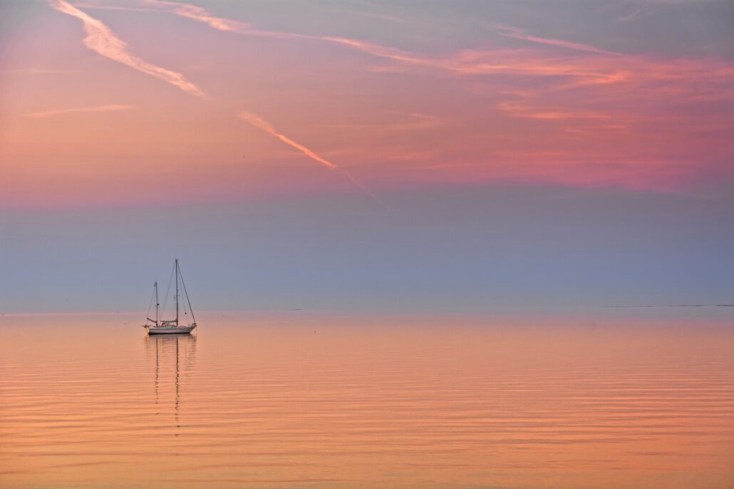 A sailing ship on the Ijsselmeer during sunset